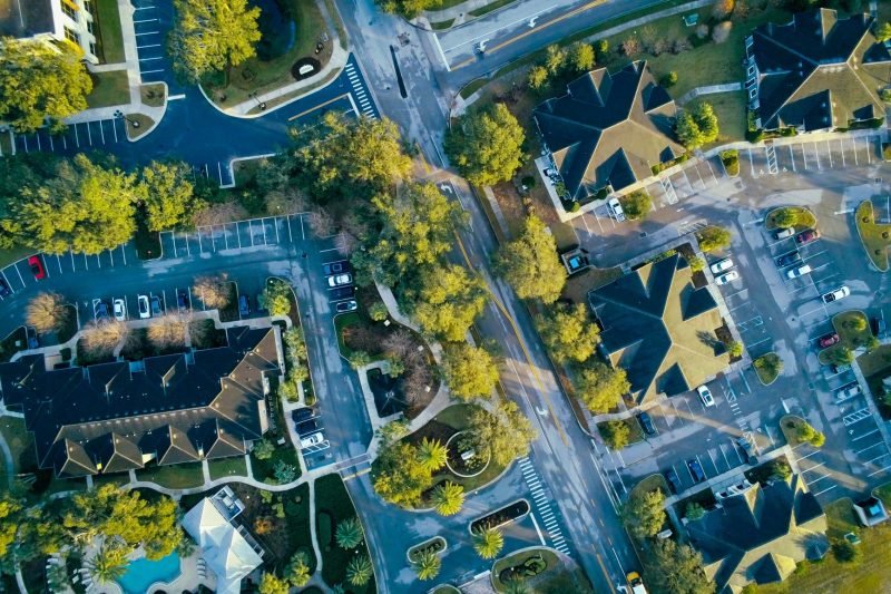 Aerial view of Lake Mary, FL, featuring residential streets and abundant greenery.